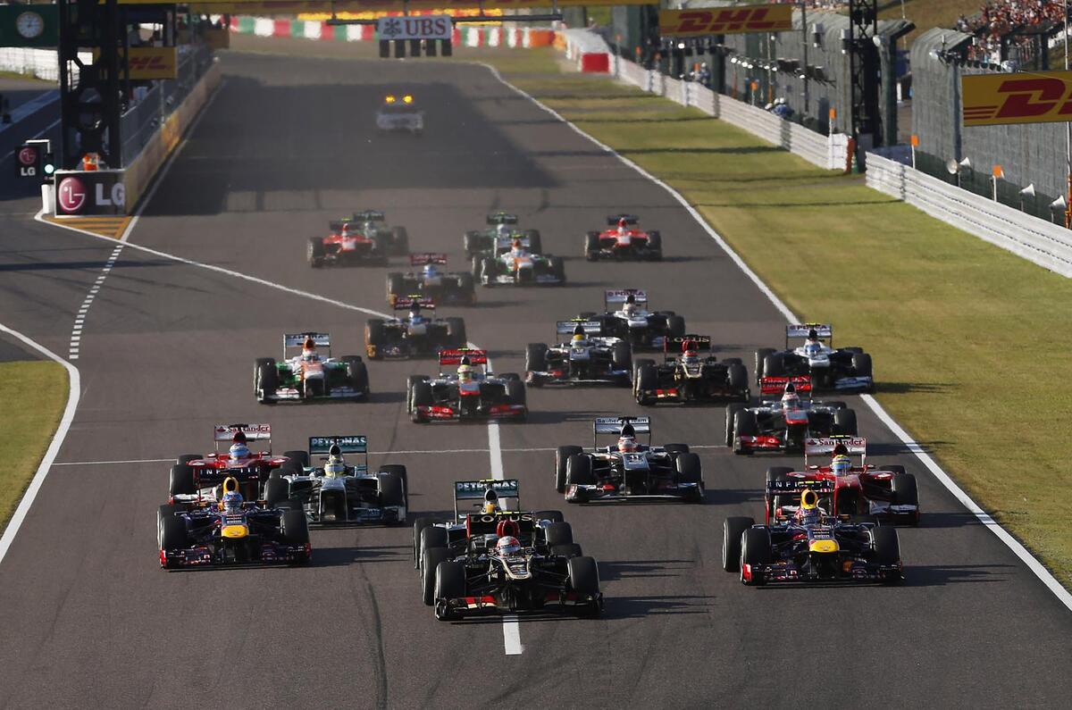 Sebastian Vettel closes on F1 title with win in Japan