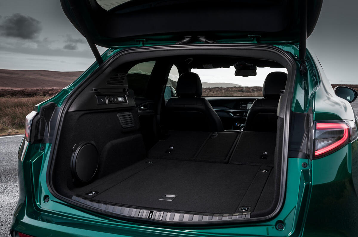 alfa romeo stelvio qv review 2024 18 boot with folded seats alfa romeo stelvio qv review 2024 18 boot with folded seats
