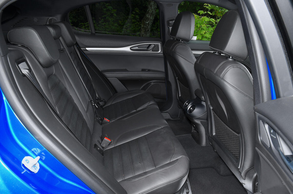 alfa romeo stelvio veloce review 2023 17 rear seats alfa romeo stelvio veloce review 2023 17 rear seats