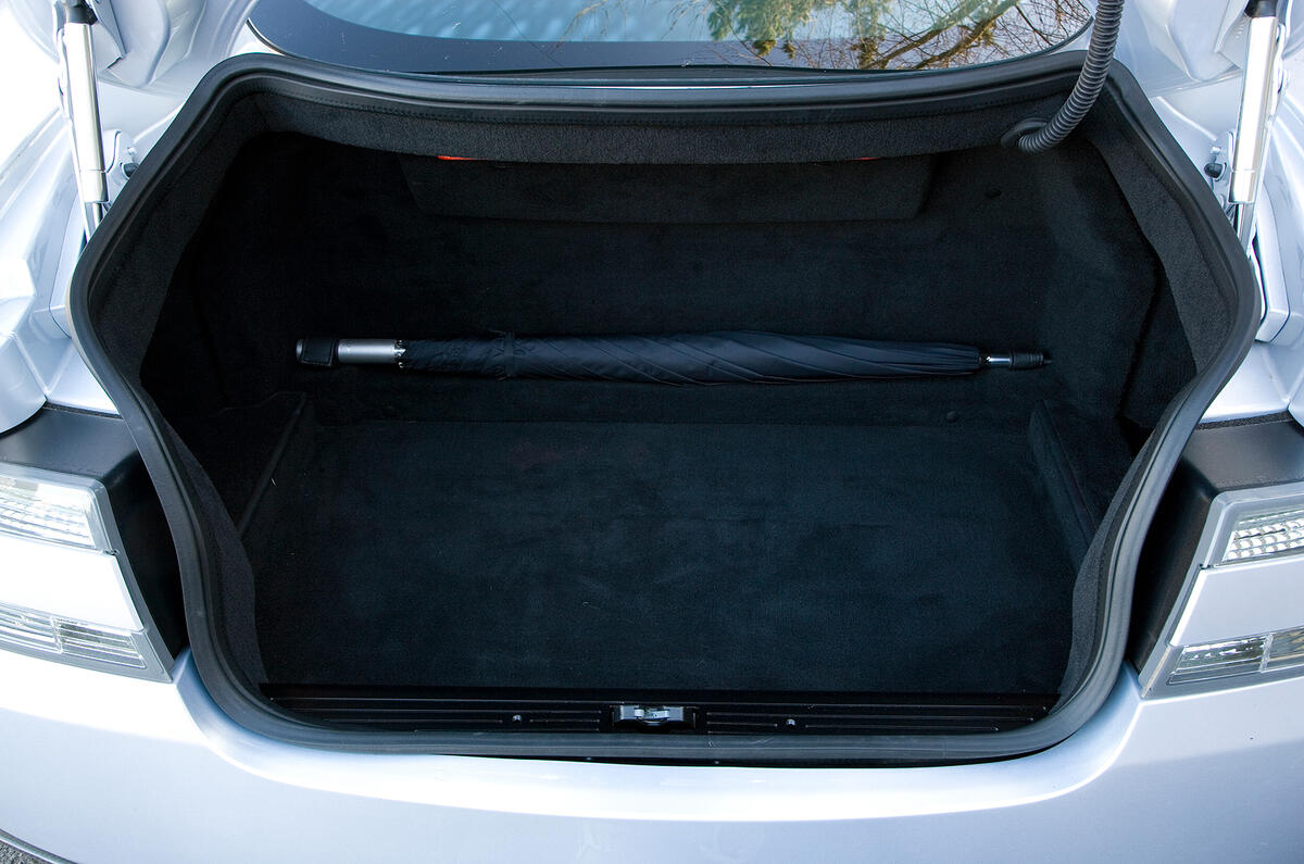 Boot is wide but quite short and shallow; space behind seats needs to be used Aston Martin DBS boot