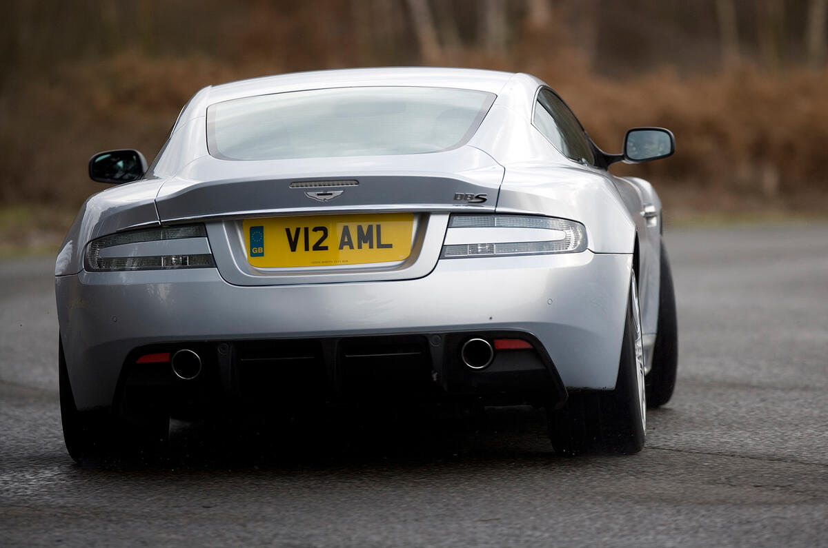 The sonorous V12 has never sounded better Aston Martin DBS rear cornering