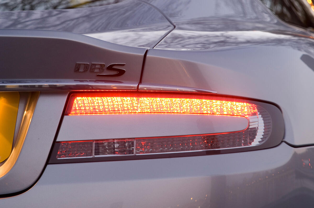Rear parking sensors come as standard on the DBS; the front units are no-cost options Aston Martin DBS rear lights