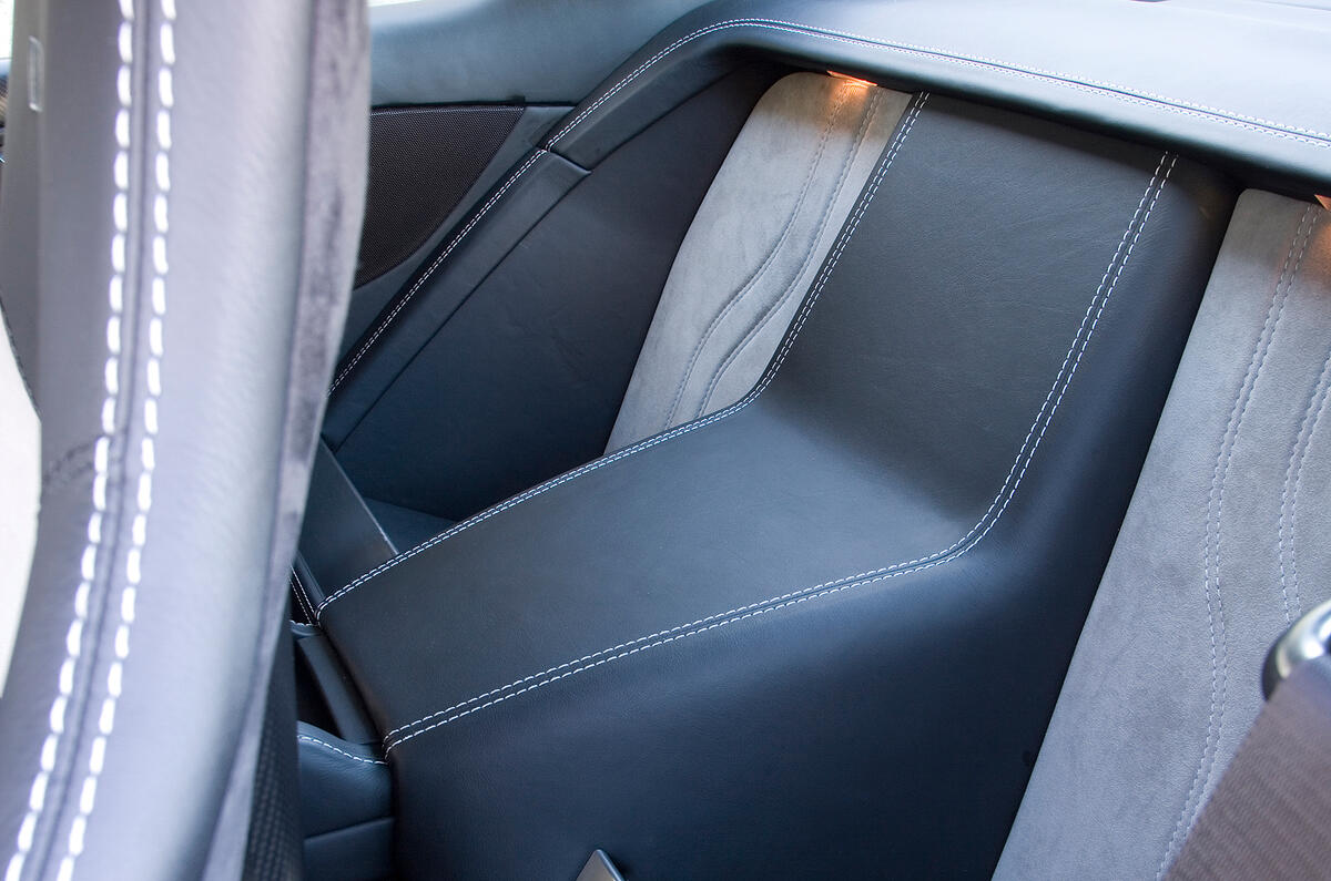 Losing the rear seats in the DBS has allowed Aston to call it a '2+0'  Aston Martin DBS's rear seats