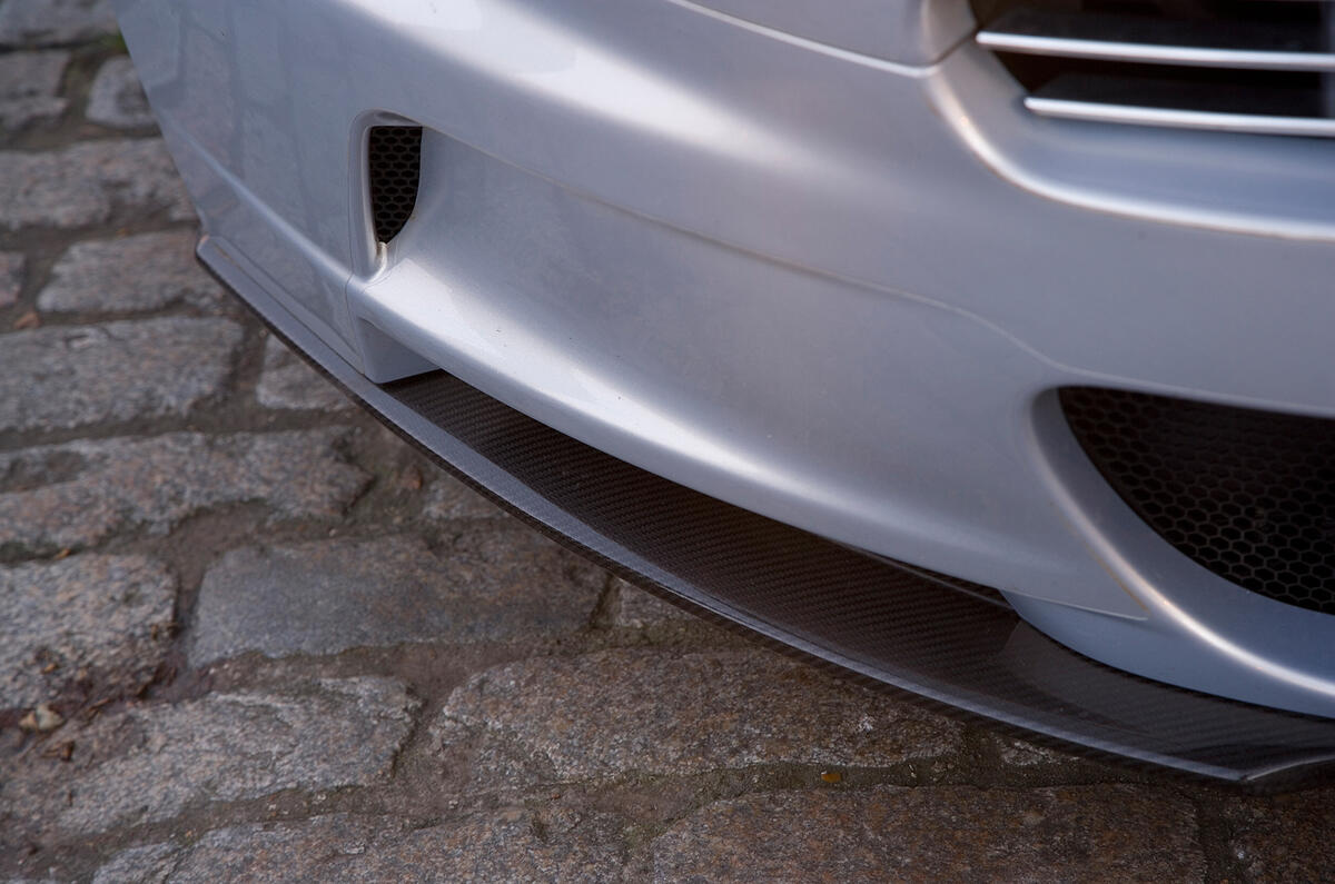 Carbonfibre splitter is a critical component, not just in reducing lift but also in achieving the correct aerodynamic balance Aston Martin DBS front splitter