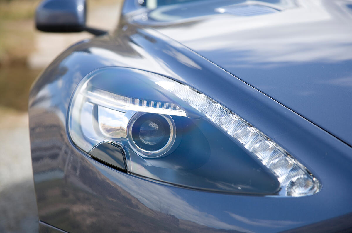 Neat LED daytime running lights fit on the inside of each headlight Aston Martin Rapide distinctive lights