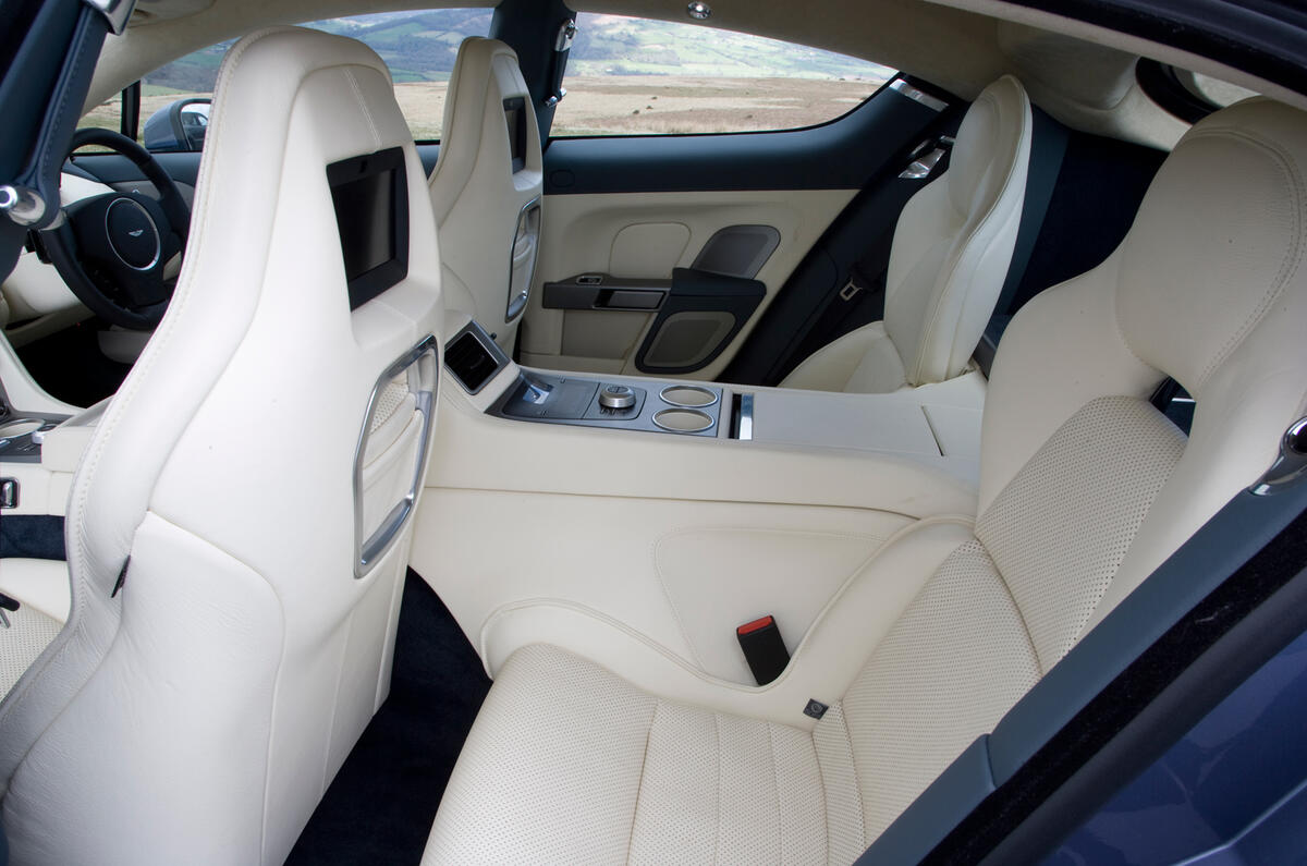 Rear seats are also comfortable but space is tight, especially for tall passengers Aston Martin Rapide's rear seats