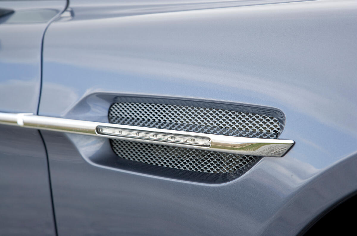 The air vent in the front wing is a styling cue adopted by Aston Martin decades ago Aston Martin Rapide side vents