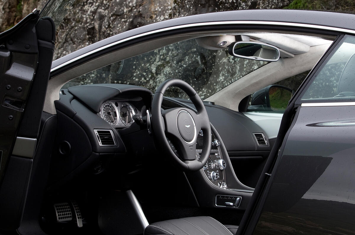 Plastic indicator stalks and cheap-feeling rotary buttons are disappointing Aston Martin Virage interior