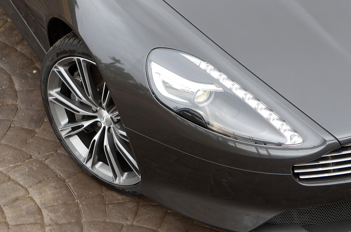 New aluminium front grille is inspired by that of the One-77. Aston Martin Virage headlights