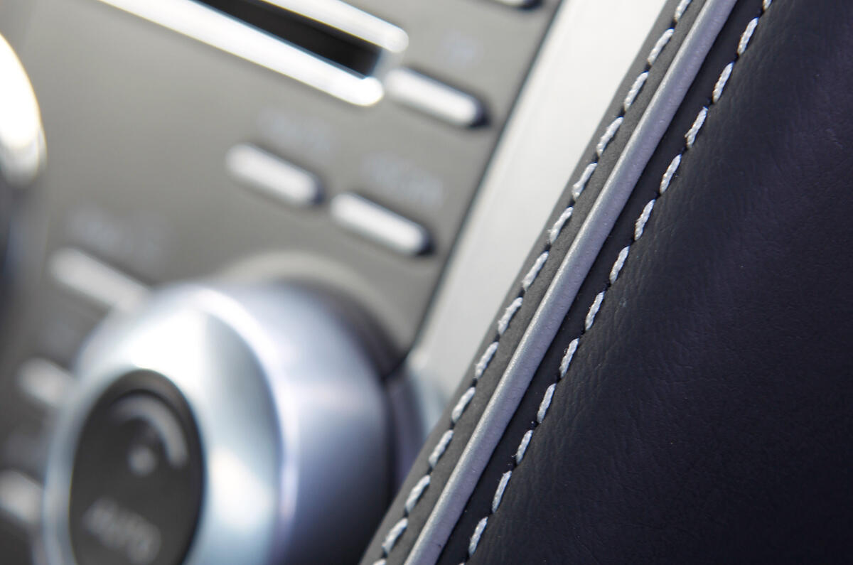 Heavy stitching adds a lavish finish to the leather interior  Aston Martin Virage leather interior
