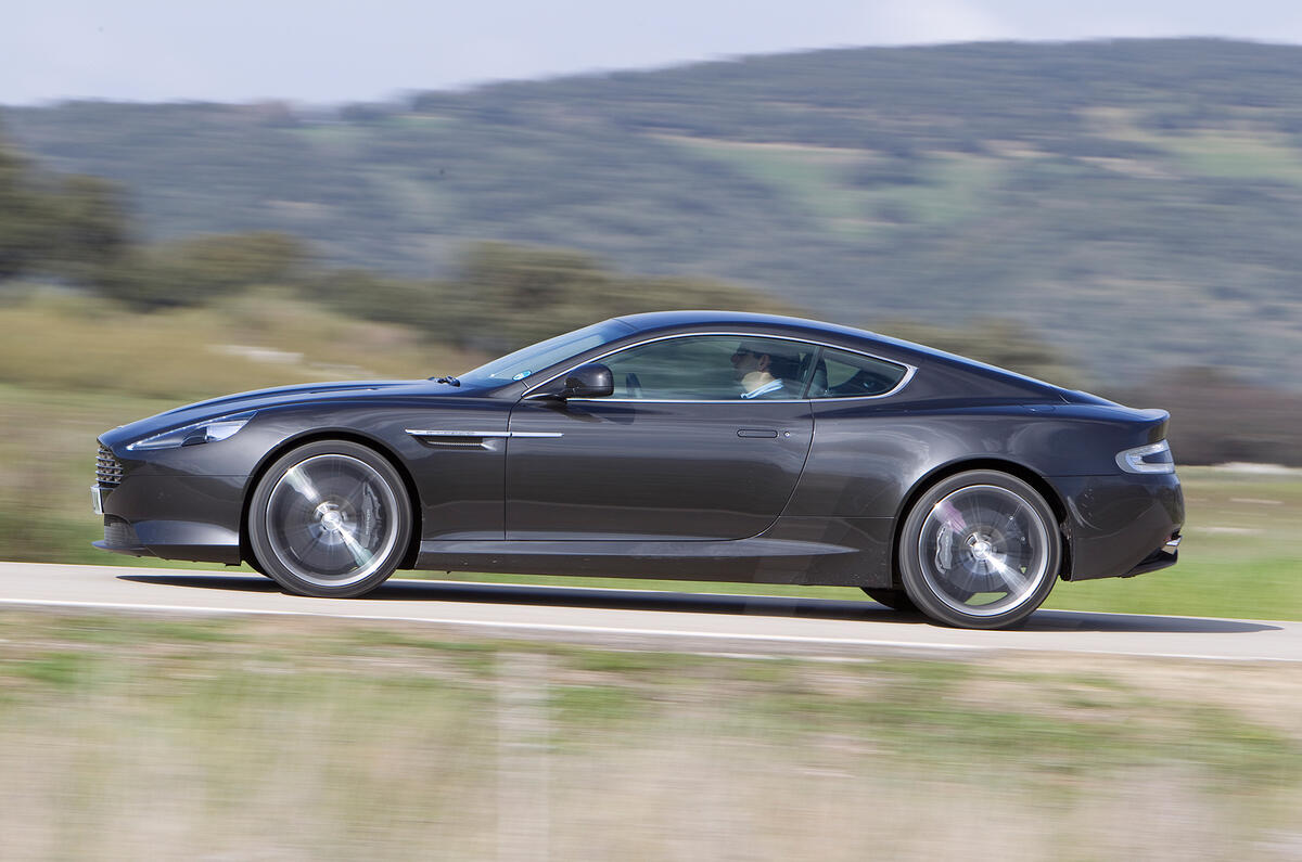 Doors open upwards at 12 degrees as well as outwards and have magnetic hinges, so they stay open at any degree Aston Martin Virage side profile