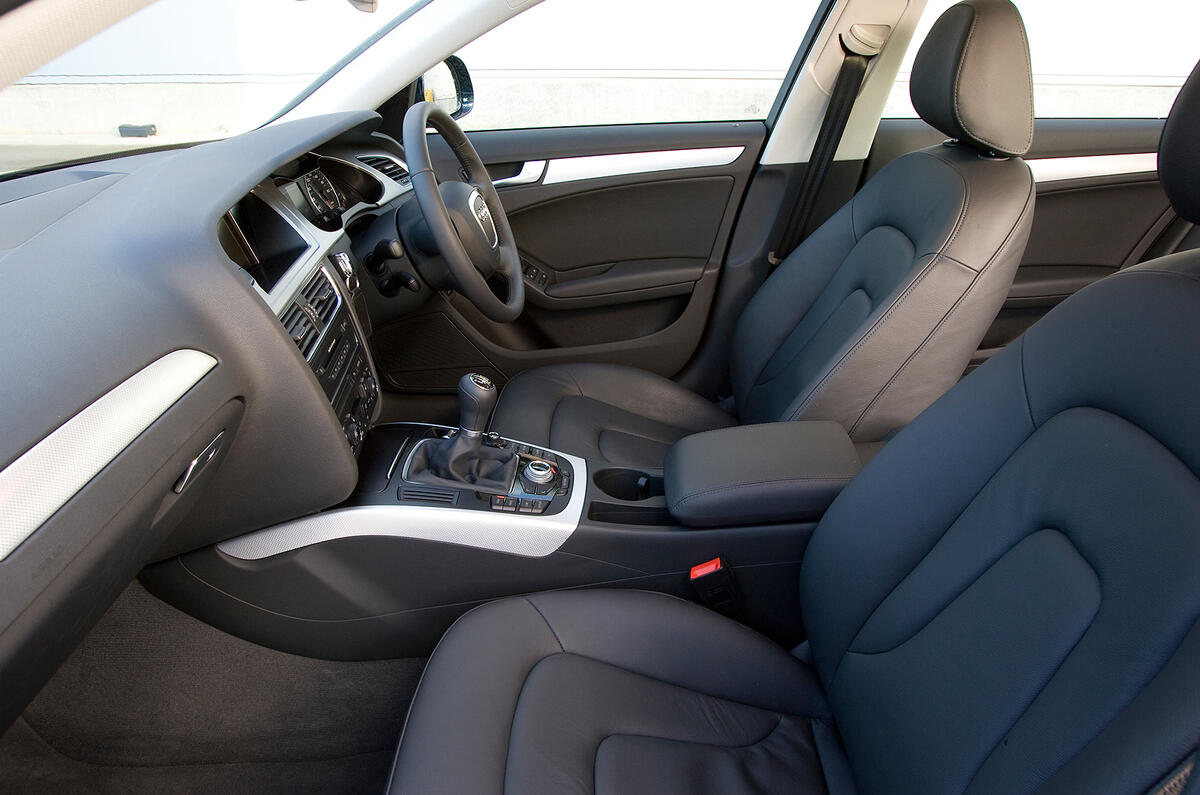 Angled dashboard is oddly retro, but it's laid out quite logically Audi A4 front seats