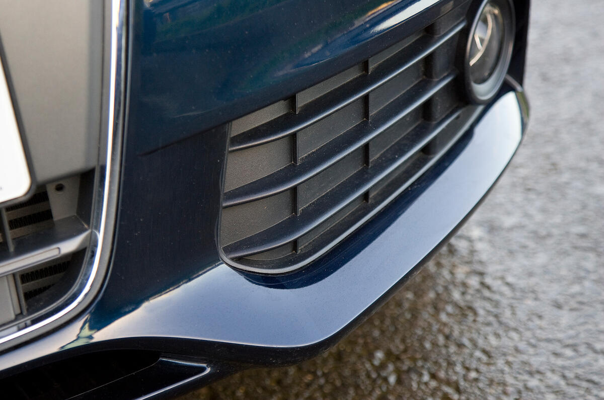 Lower lip spoiler protudes on either side of the grille and helps to lower drag  Audi A4's lower lip spoiler