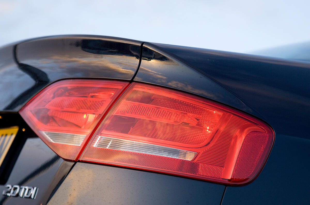 Indented vertical panel of bootlid is another drag-reducing feature Audi A4's rear lights