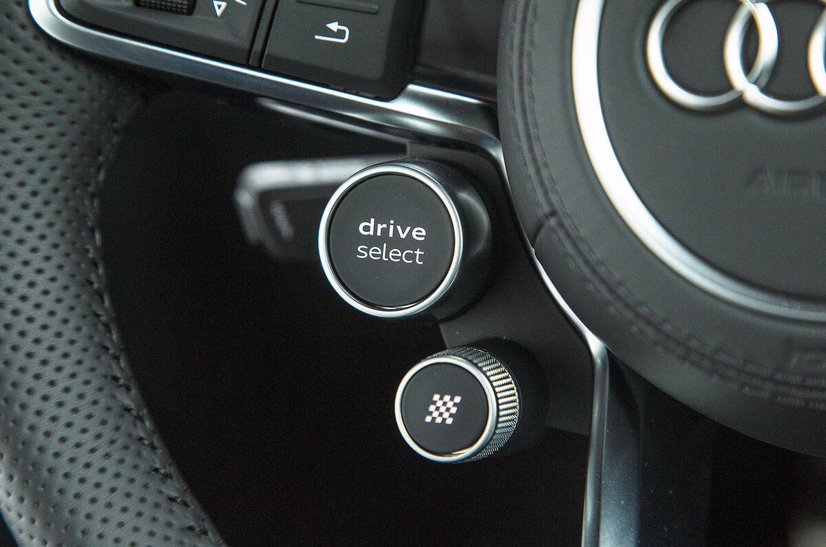 The driver select and launch control buttons on the Audi R8