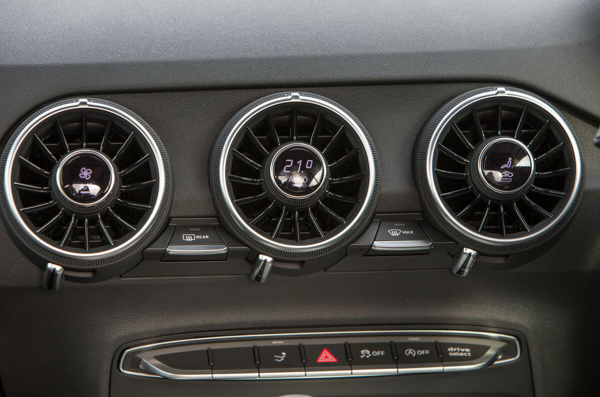 The triple vents and climate control switchgear on the Audi TT