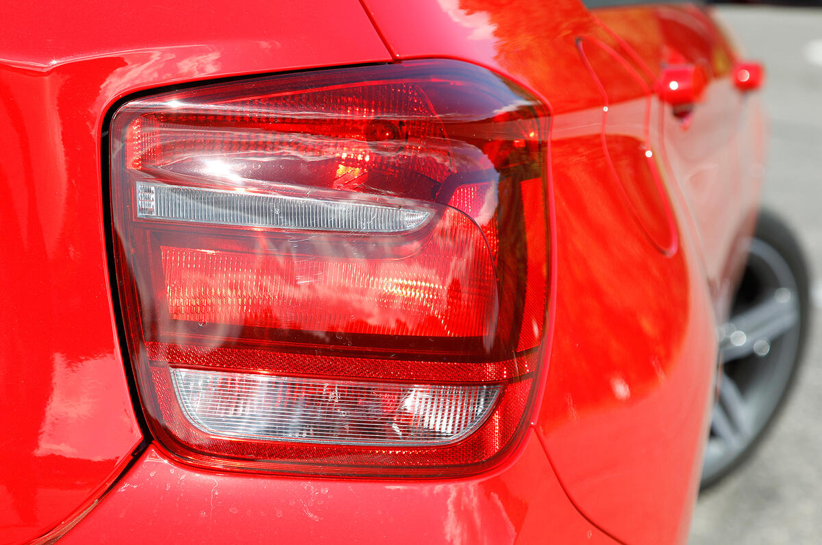 Traditionally, BMW rear lights extend from the wings on to the bootlid. The 1-series is unique in having upright units BMW 1 Series tailights