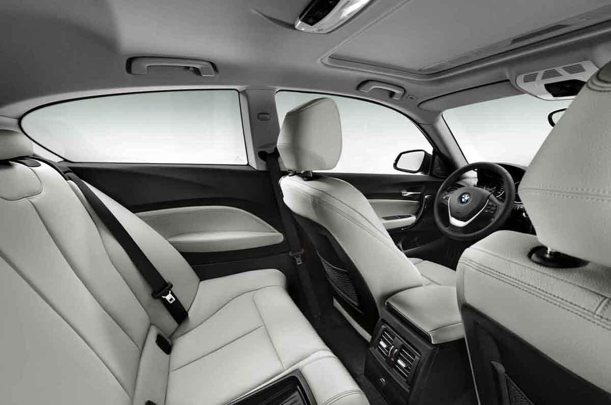 Three-door BMW 1-series uncovered