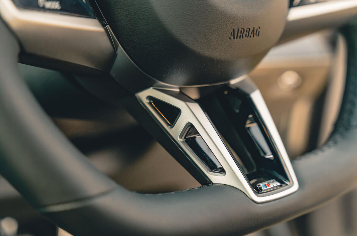 bmw 530e review 2024 12 steering wheel