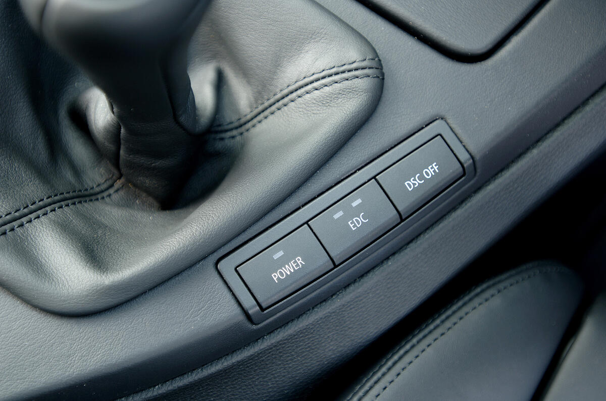 BMW M3 electronic damper button