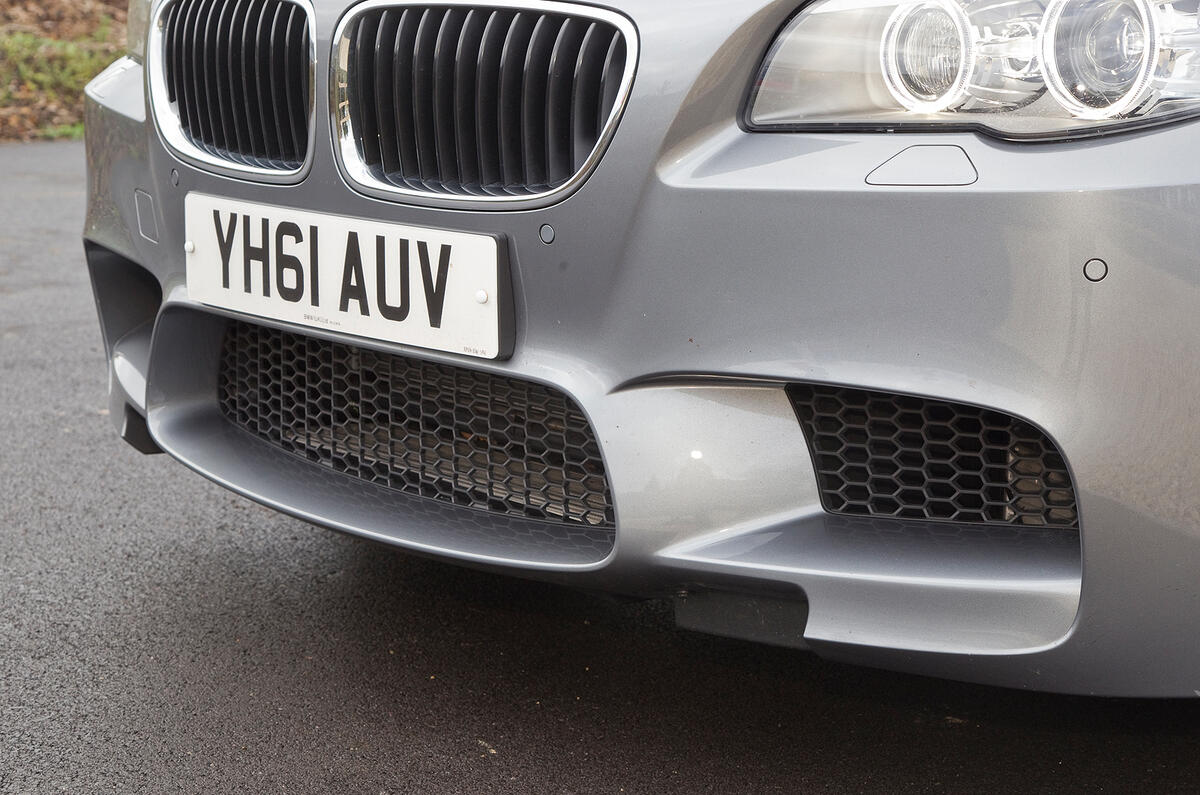 Vast air intakes feed ten individual oil and water coolers BMW M5's vast air intakes