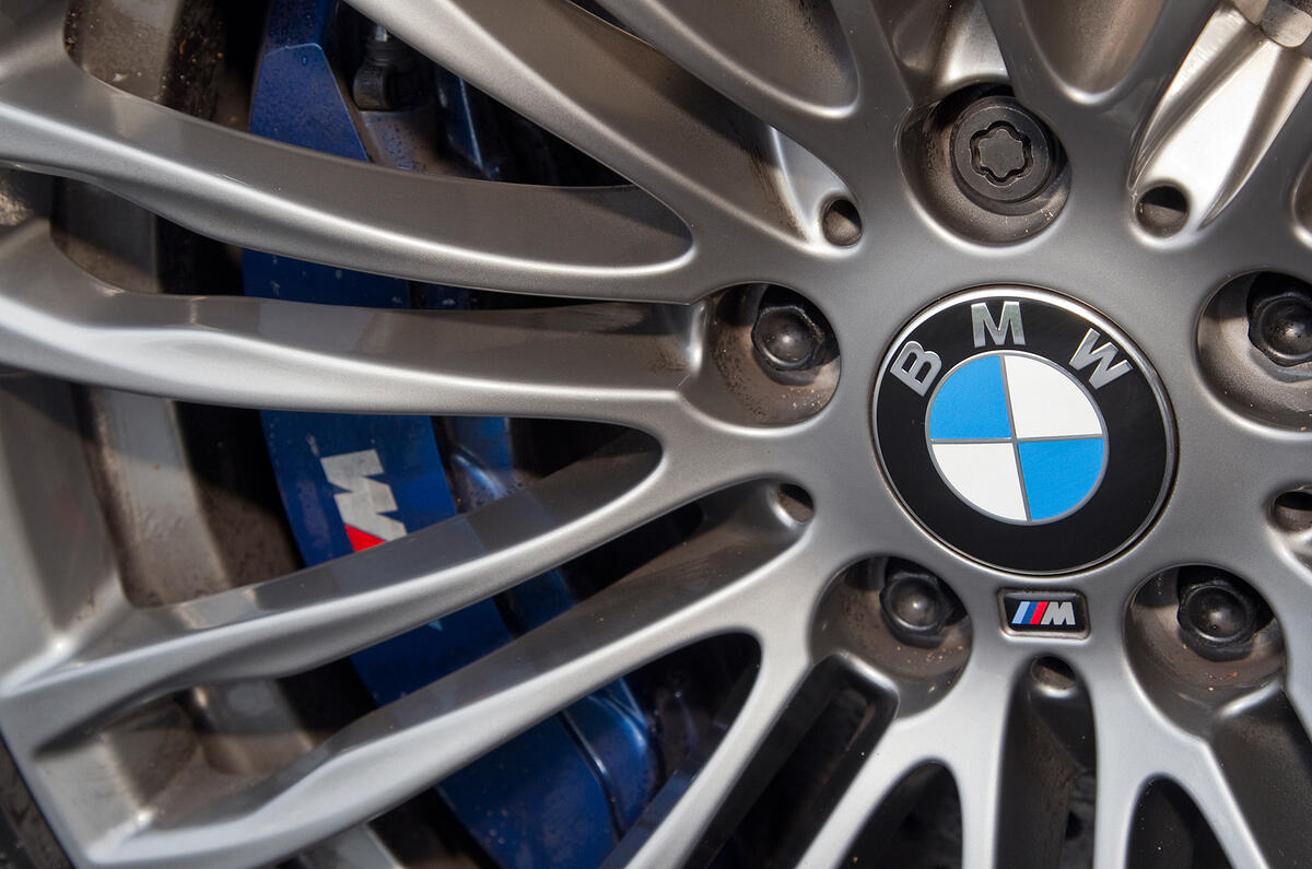 These 19in alloys are standard; lighter 20in options are available BMW M5 blue brake calipers