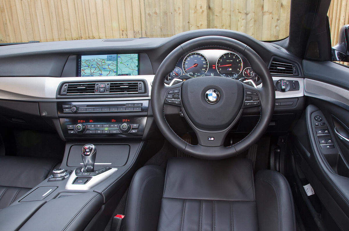 Cabin features M5-exclusive textured aluminium trim BMW M5 interior