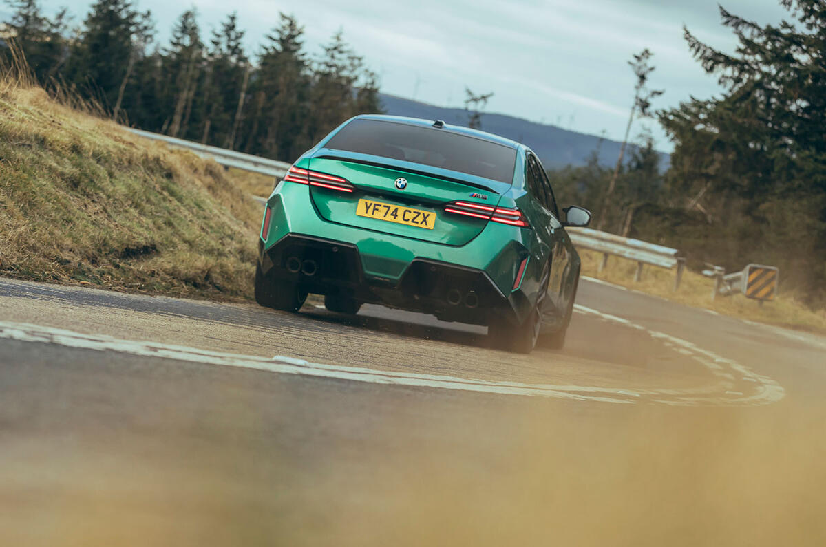 BMW M5 review 2025 032 rear cornering