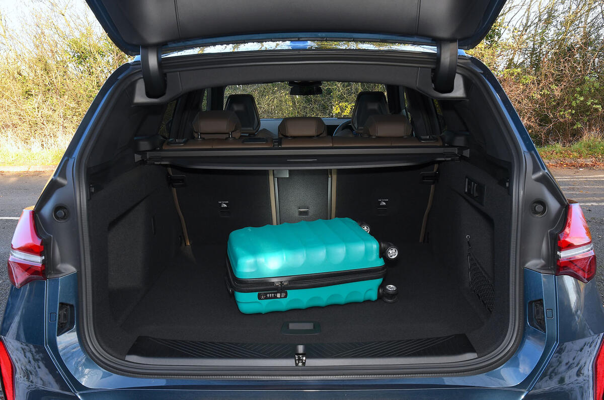 BMW X320 2024 Review boot 6987