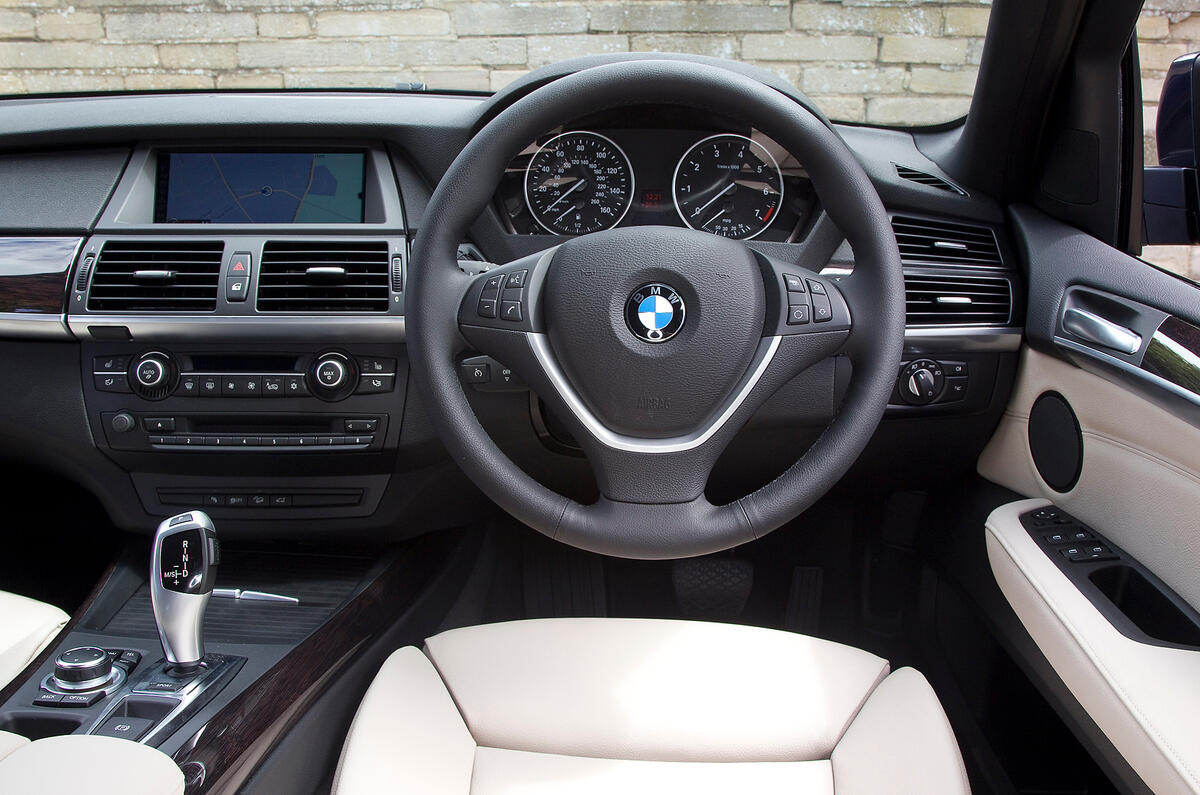 The business end of the cabin is modern-looking and clutter free BMW X5 interior