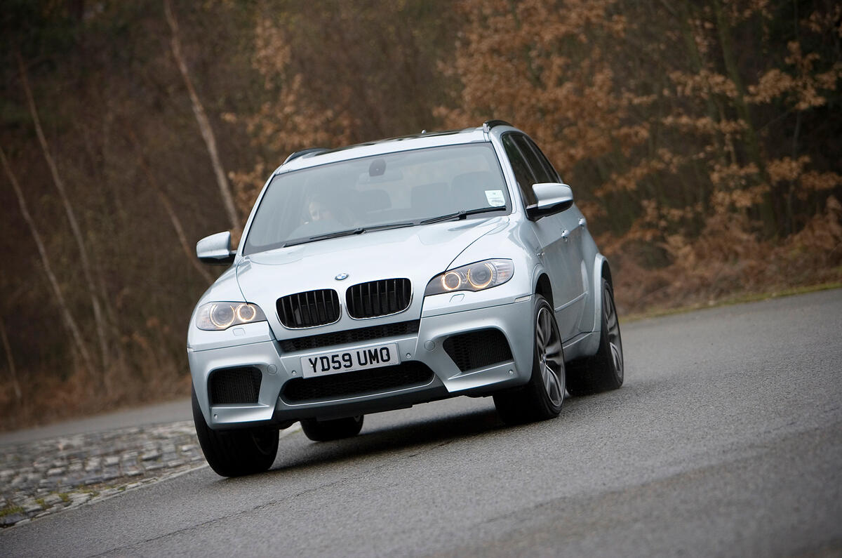 If you find yourself oversteering and staying on the power, xDrive will send power to the front wheels to help pull the car straight again and thus out of the tail slide.  BMW X5 cornering