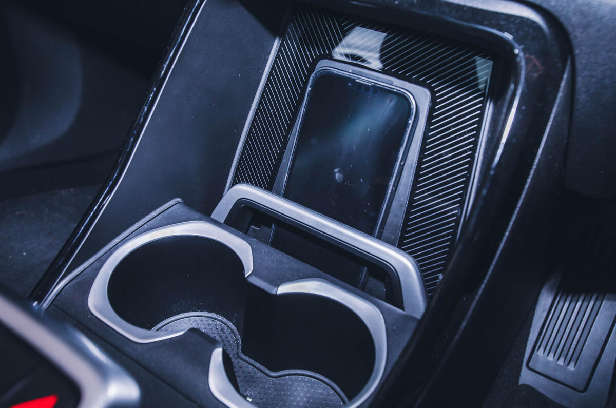 BMW iX1 cupholders and wireless phone charger