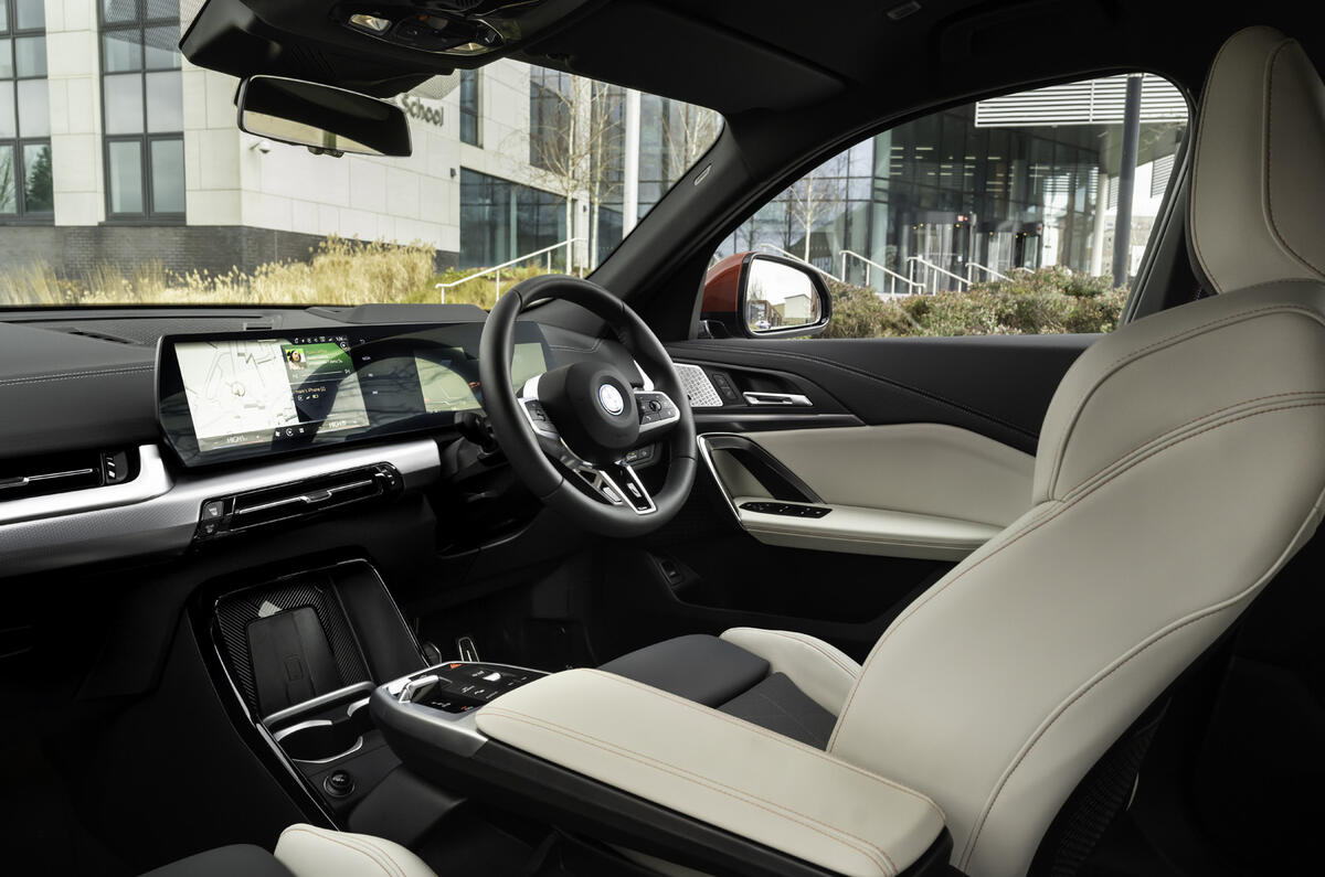 BMW iX2 cabin from passenger side BMW iX2 cabin from passenger side