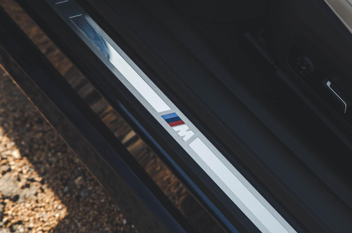 BMW M440i Cabriolet in blue   door sill BMW M440i Cabriolet in blue   door sill