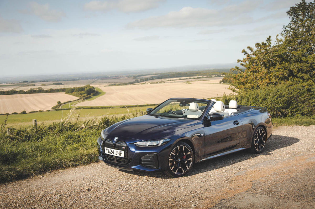 BMW M440i Cabriolet in blue   static front three quarters BMW M440i Cabriolet in blue   static front three quarters