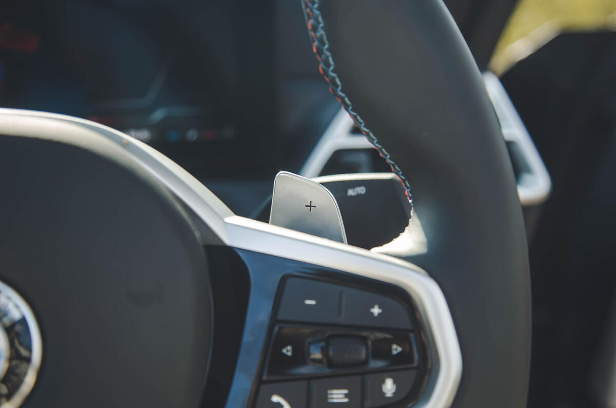 BMW M440i Cabriolet in blue   steering wheel buttons BMW M440i Cabriolet in blue   steering wheel buttons
