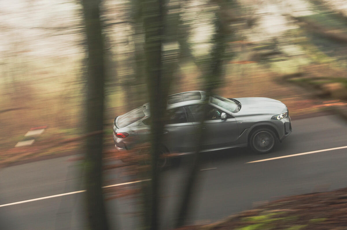 BMW X6 through some trees BMW X6 through some trees