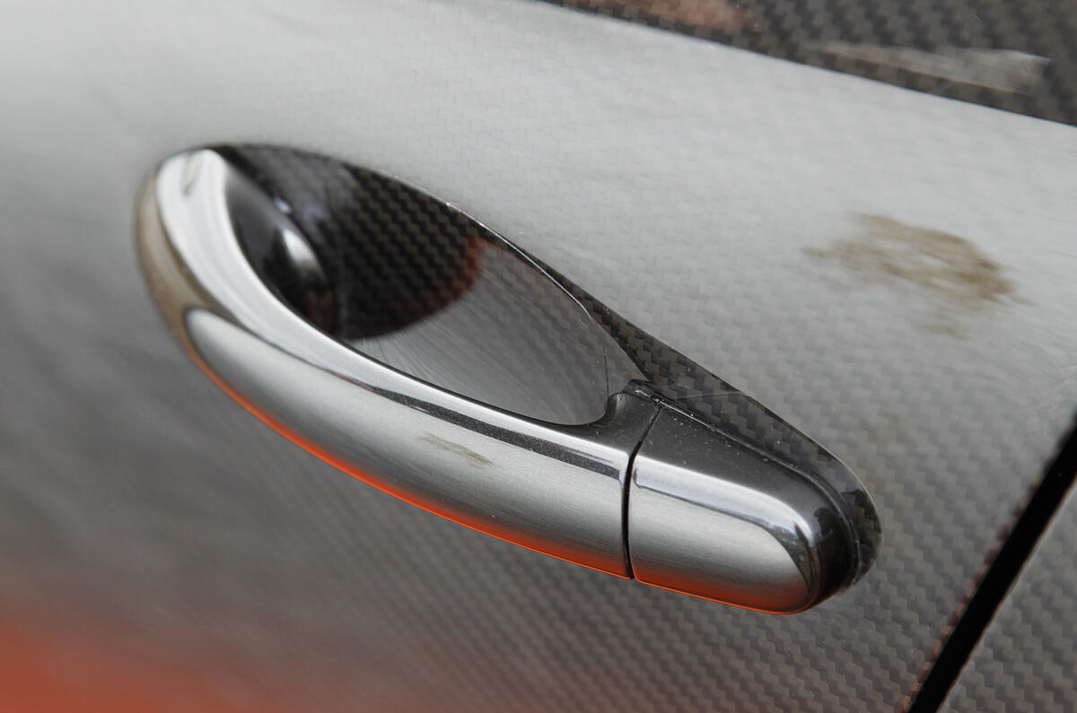 Even the door handles are constructed from carbon fibre Bugatti Veyron door handles