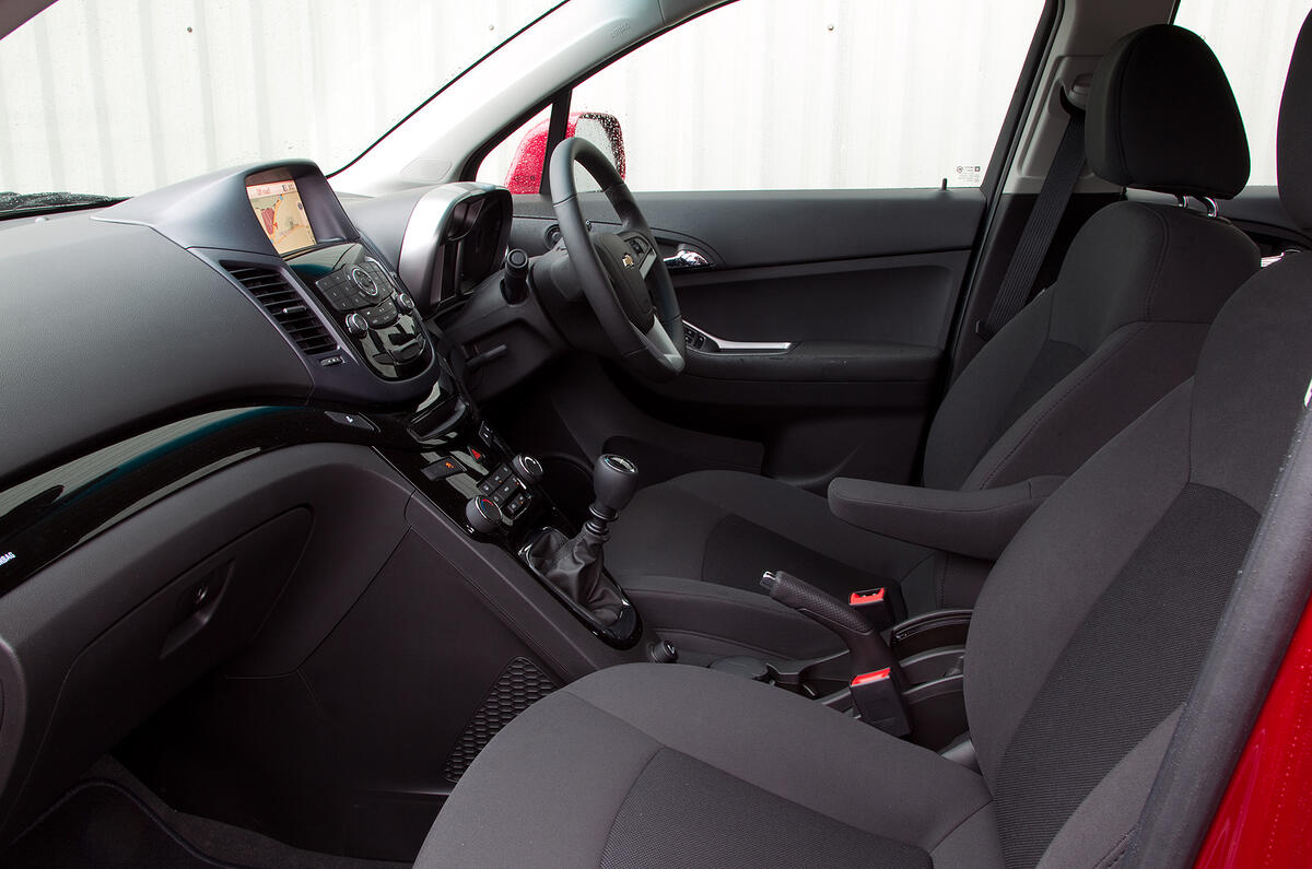 It feels quite classy and, large gearknob aside, the driving ergonomics are good Chevrolet Orlando front seats