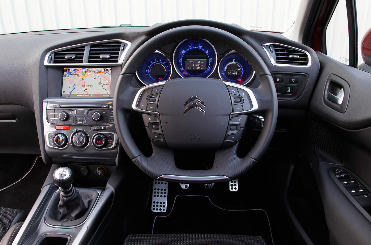 Thick leather steering wheel has a flattened base, which allows extra knee room Citroën C4 interior