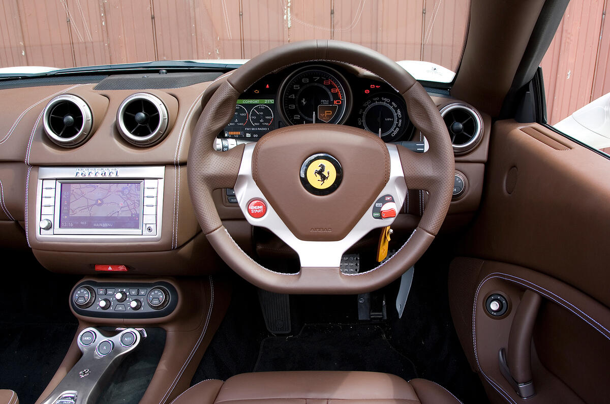 Perfect wheel and rim width, but ergonomically poor flat bottom Ferrari California dashboard