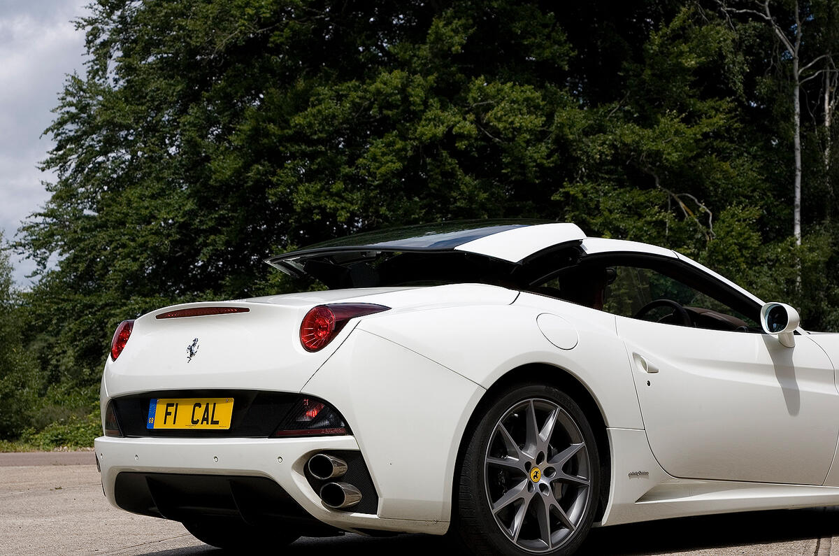 The California needs to be stationary for the roof to operate, but it does so with some precision Ferrari California roof up