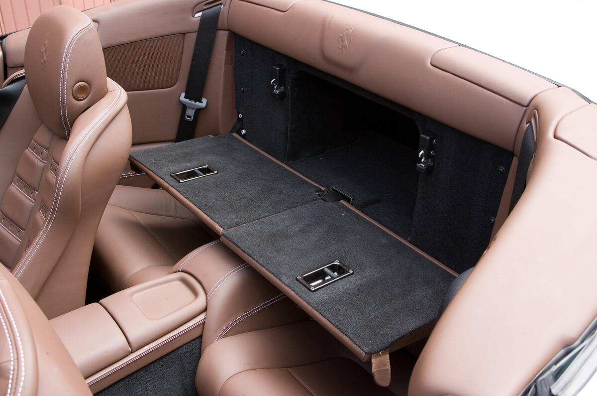 The rears will only seat kids for short periods; flaps help to boost boot length Ferrari California rear seats down
