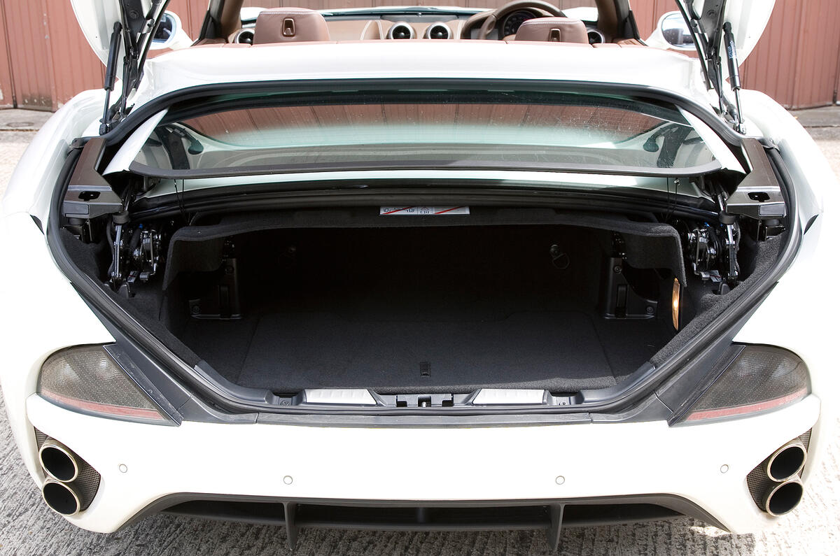 Boot volume drops from 340 litres to a still useful 240 litres with the roof down Ferrari California boot space
