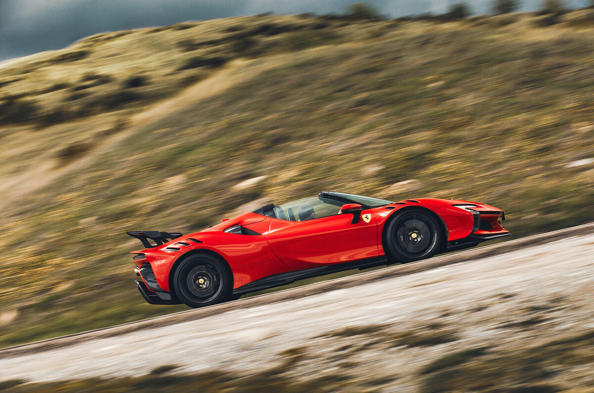 ferrari sf90 xx spider review 2024 25 side panning ferrari sf90 xx spider review 2024 25 side panning