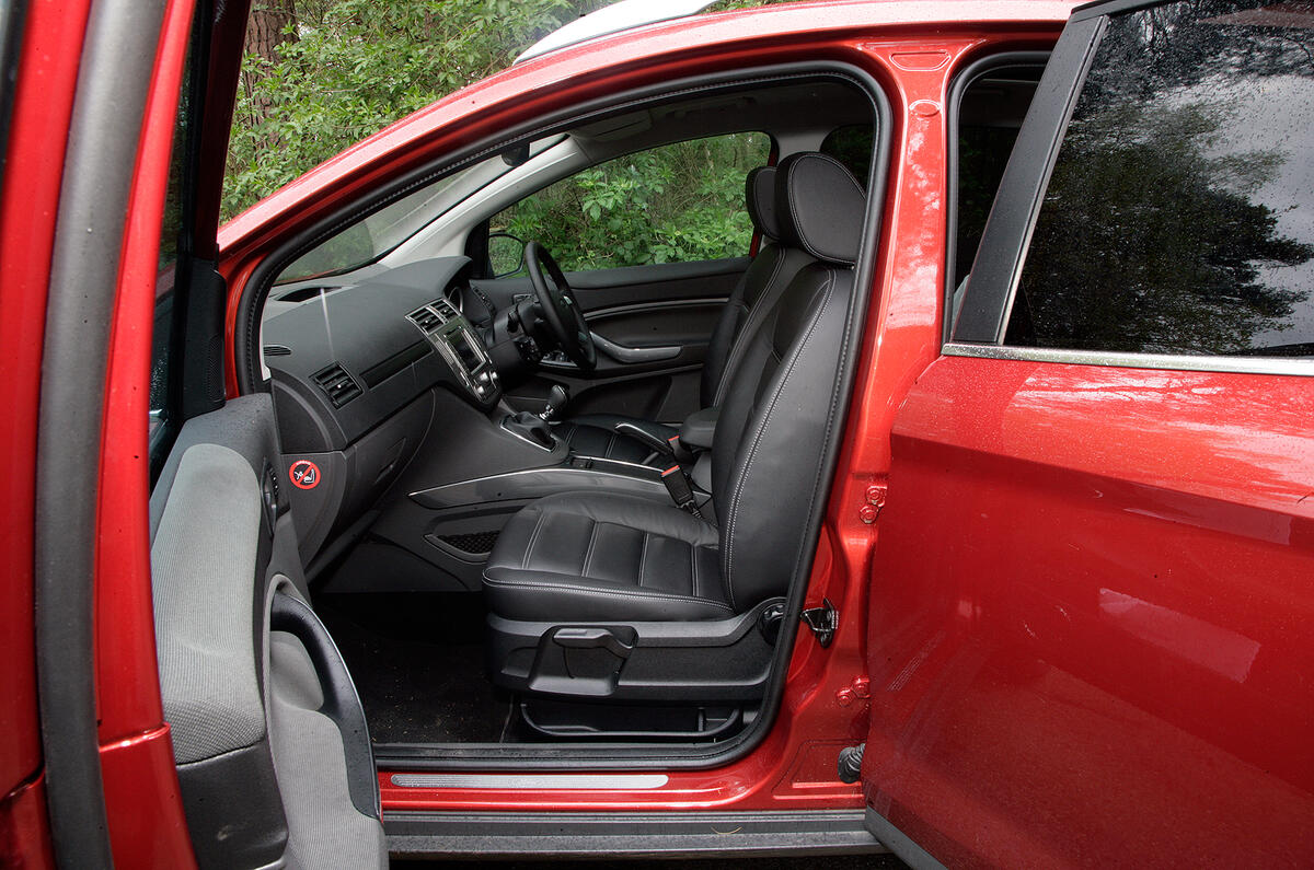 Leather seats are comfortable, if a little flat. It’s spacious up front… Ford Kuga front seats