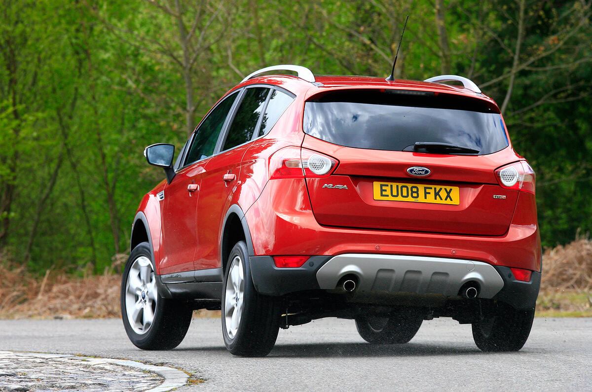 The fact it’s higher and heavier than a Focus is apparent at every turn Ford Kuga rear cornering