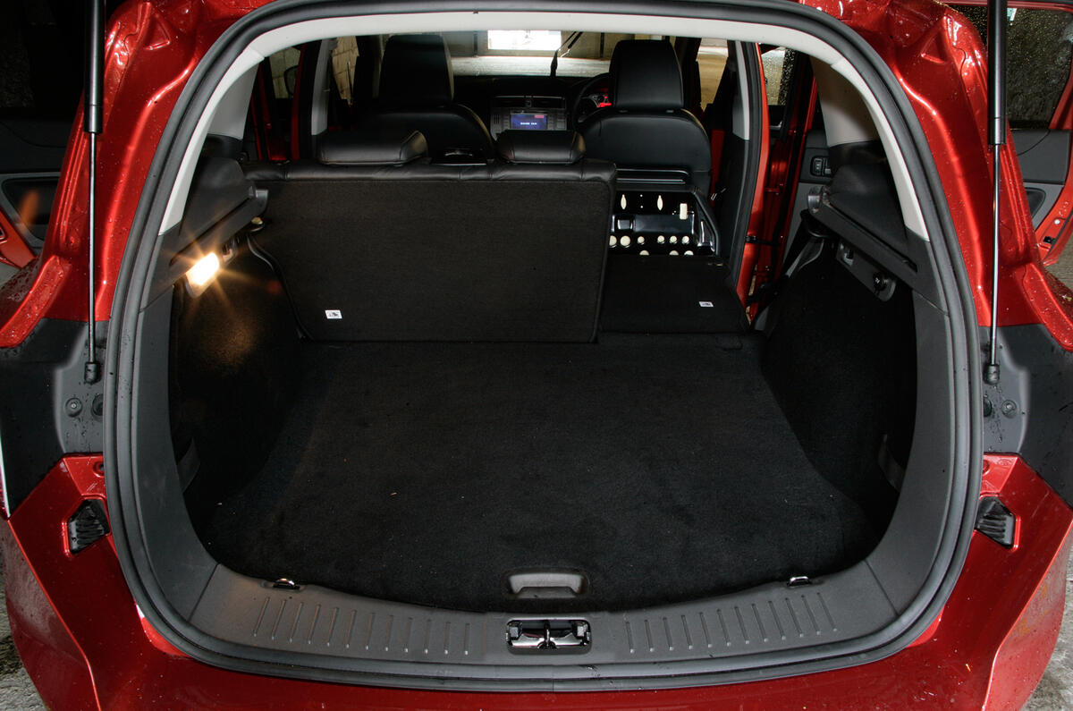 At least the boot is a good shape. Lip is high but the tailgate splits for quick access Ford Kuga boot space