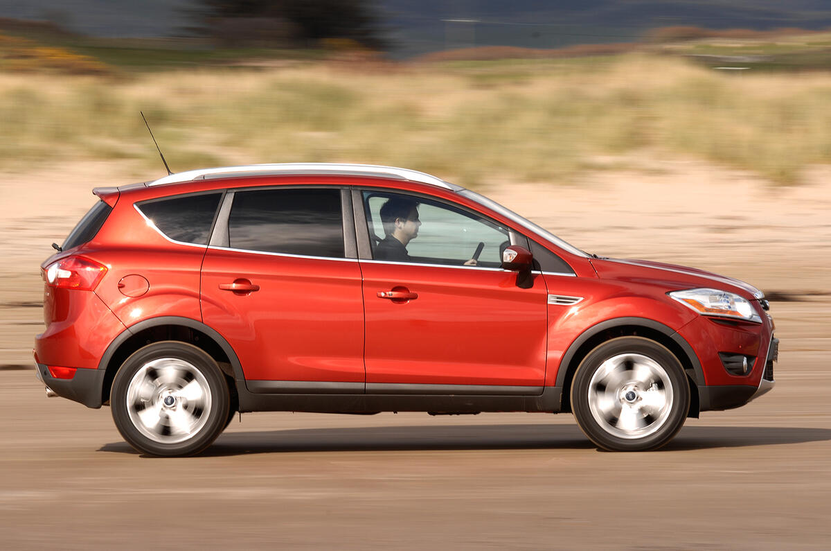 You can make fair progress through traffic and overtake quite effectively Ford Kuga side profile