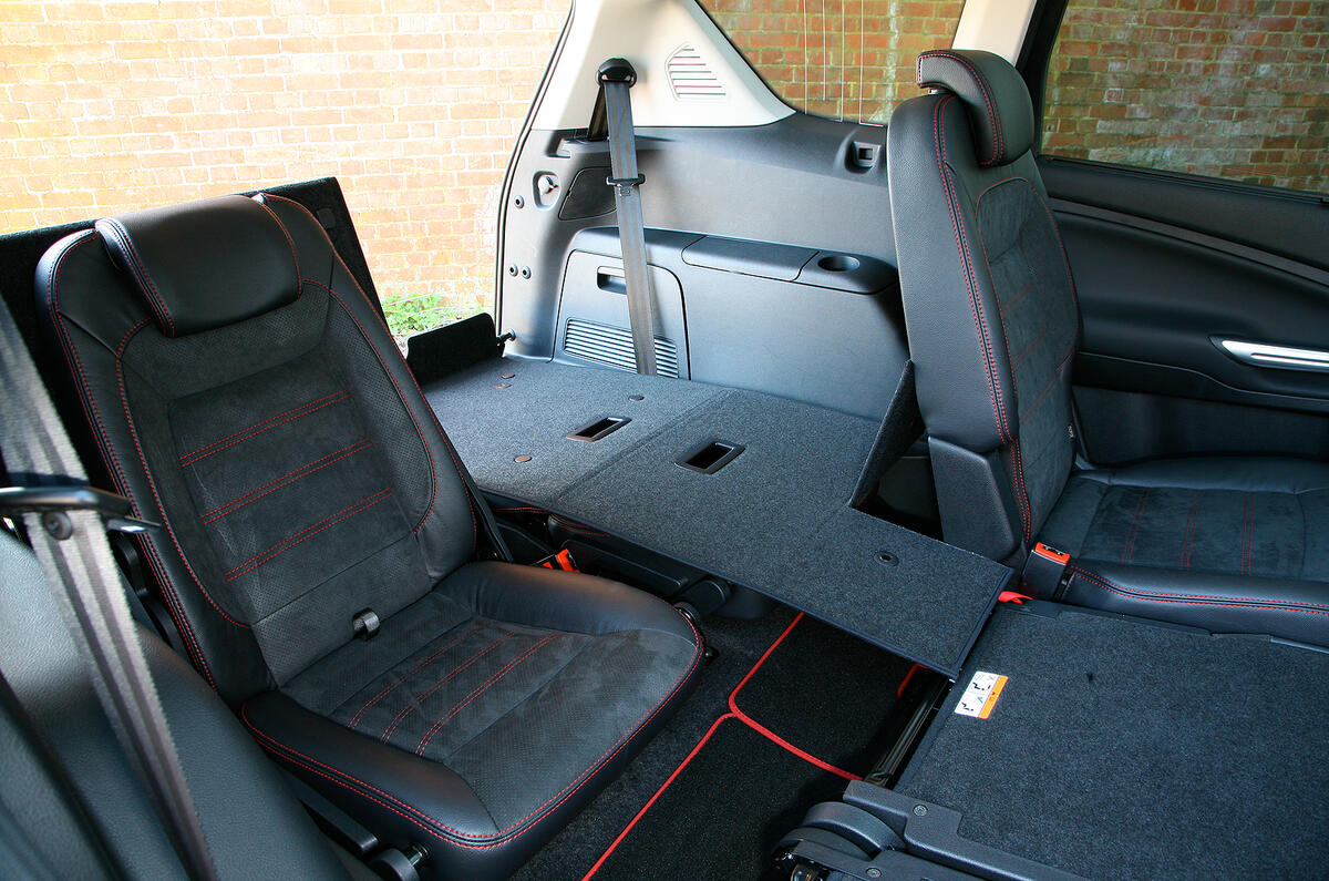 Rearmost seats fold up out of the floor; even adults will find them usable Ford S-Max third row seats